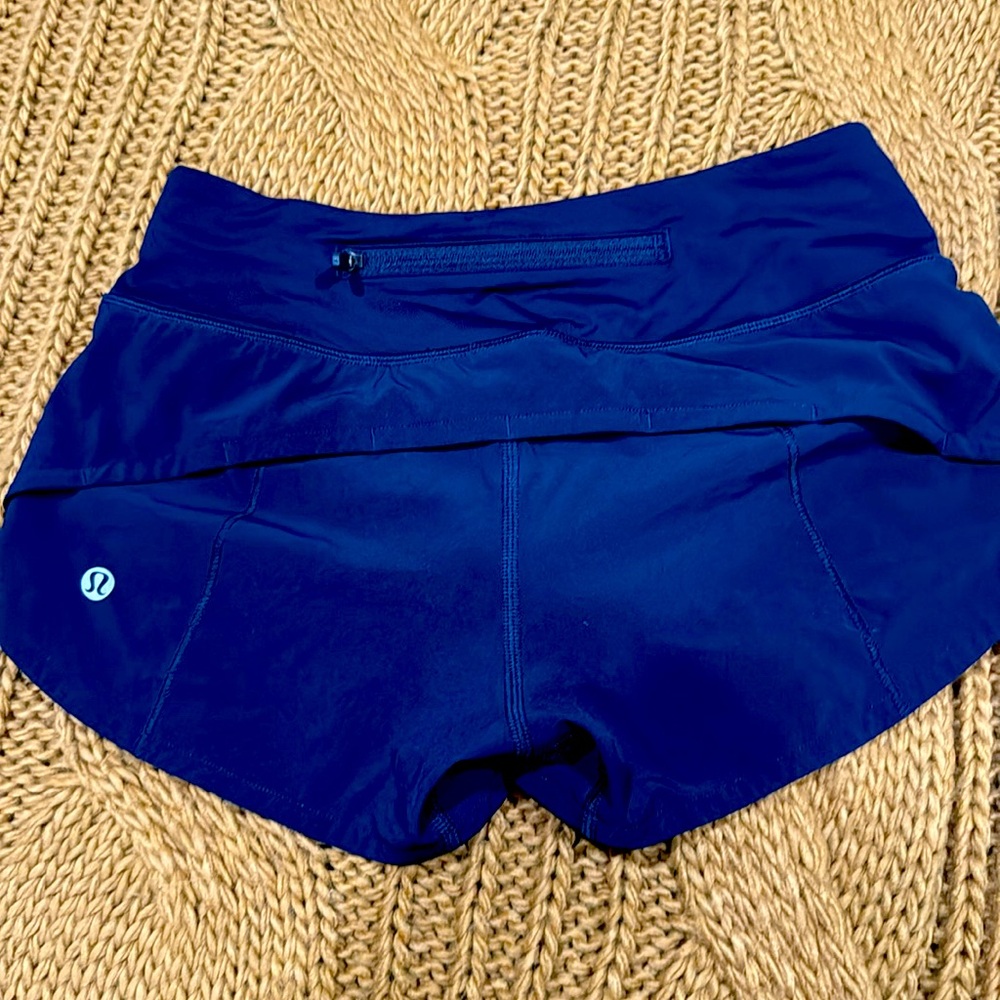 Lululemon  dark blue shorts.